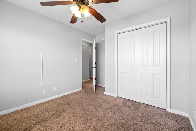 1382 Whitt Ln, Clarksville, TN 37042 - unfurnished bedroom featuring carpet flooring, baseboards, a closet, a textured ceiling, and a ceiling fan