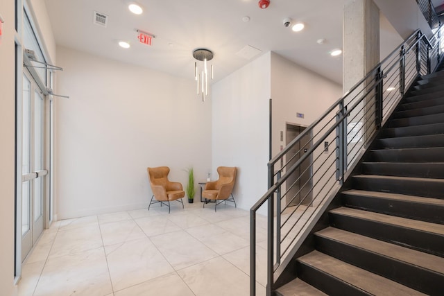 303 31st Ave N Unit 305, Nashville, TN 37203 - stairs with recessed lighting and tile patterned floors