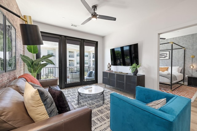 303 31st Ave N Unit 305, Nashville, TN 37203 - living area featuring wood finished floors and ceiling fan