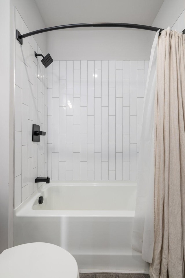 303 31st Ave N Unit 305, Nashville, TN 37203 - full bathroom featuring shower / bath combination with curtain and toilet