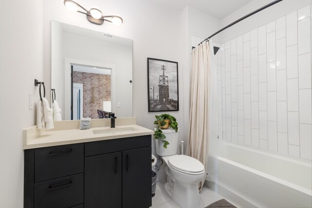 303 31st Ave N Unit 305, Nashville, TN 37203 - full bath with vanity, toilet, and shower / bath combination with curtain