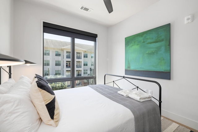 303 31st Ave N Unit 305, Nashville, TN 37203 - bedroom featuring baseboards and ceiling fan