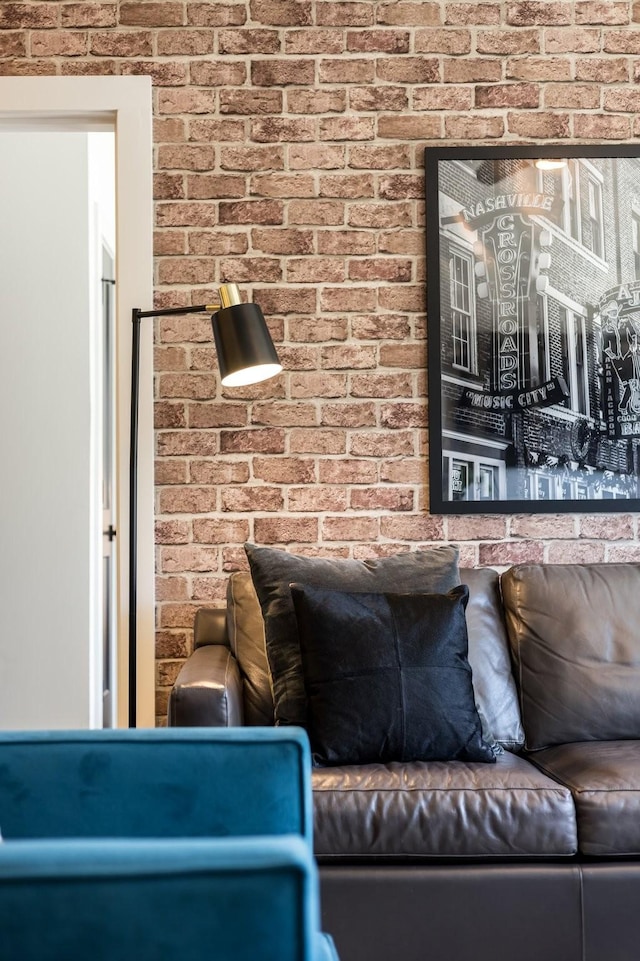 303 31st Ave N Unit 305, Nashville, TN 37203 - living area featuring brick wall