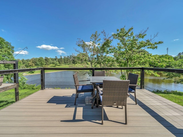 108 Birdie Ct, Dickson, TN 37055 - deck with outdoor dining space, a water view, and view of wooded area