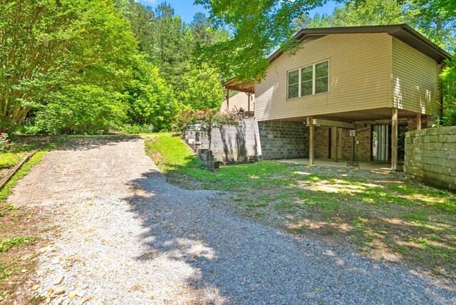 160 Terrapin Run Rd, Dover, TN 37058 - view of side of property with dirt driveway and a carport