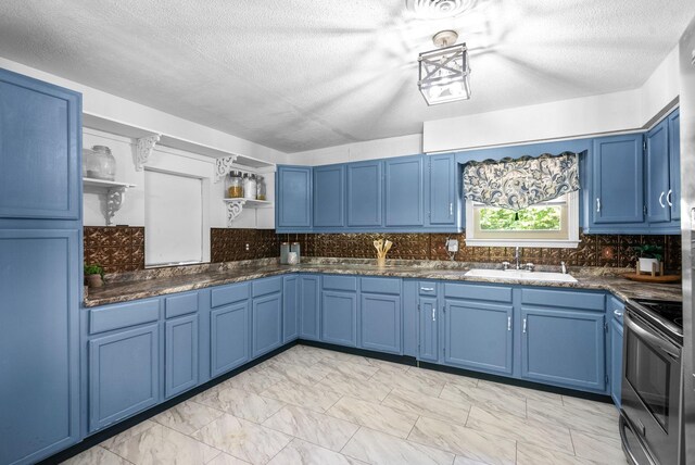 160 Terrapin Run Rd, Dover, TN 37058 - kitchen with open shelves, stainless steel electric stove, blue cabinetry, and a textured ceiling