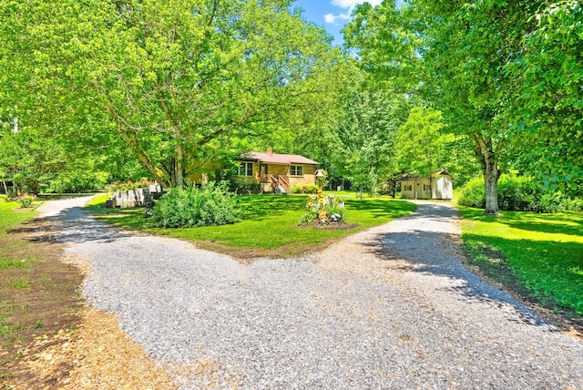 160 Terrapin Run Rd, Dover, TN 37058 - view of front of property featuring driveway, a front yard, and a chimney