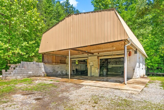160 Terrapin Run Rd, Dover, TN 37058 - back of property featuring an outdoor structure and concrete block siding