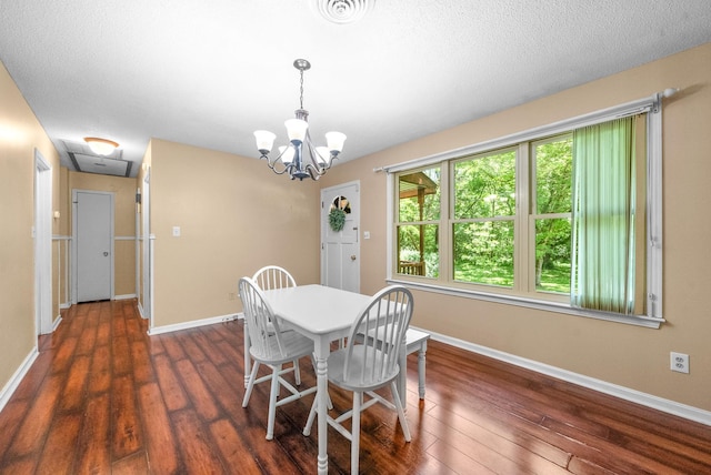 160 Terrapin Run Rd, Dover, TN 37058 - dining space with dark wood finished floors, baseboards, a chandelier, and a textured ceiling