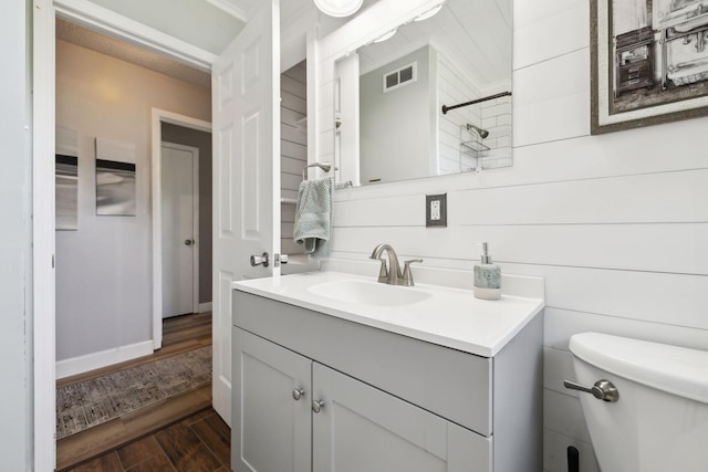 221 Cedar Creek Dr, Mount Juliet, TN 37122 - bathroom with vanity, toilet, wood finished floors, and baseboards