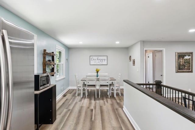 221 Cedar Creek Dr, Mount Juliet, TN 37122 - dining space with light wood-style flooring, recessed lighting, and baseboards