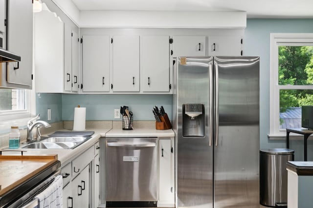 221 Cedar Creek Dr, Mount Juliet, TN 37122 - kitchen with stainless steel appliances, healthy amount of natural light, white cabinets, and a sink