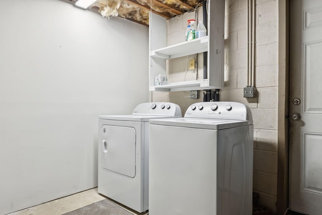 221 Cedar Creek Dr, Mount Juliet, TN 37122 - laundry room with independent washer and dryer and concrete block wall