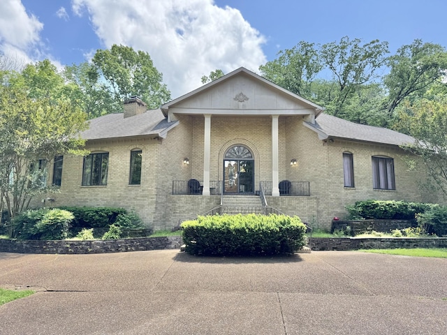 320 Shutes Cv, Old Hickory, TN 37138 - greek revival house with brick siding and a chimney