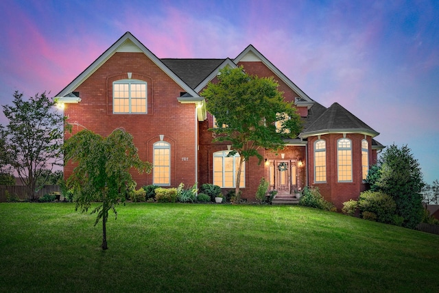 767 Dixie Ln, Pleasant View, TN 37146 - traditional-style home with a front lawn and brick siding