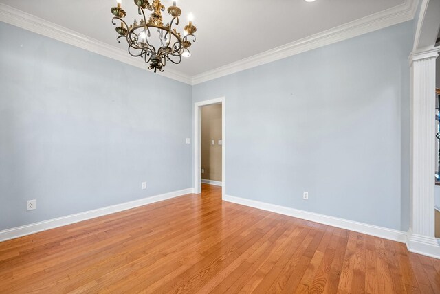 767 Dixie Ln, Pleasant View, TN 37146 - spare room with a chandelier, baseboards, crown molding, and light wood-style floors