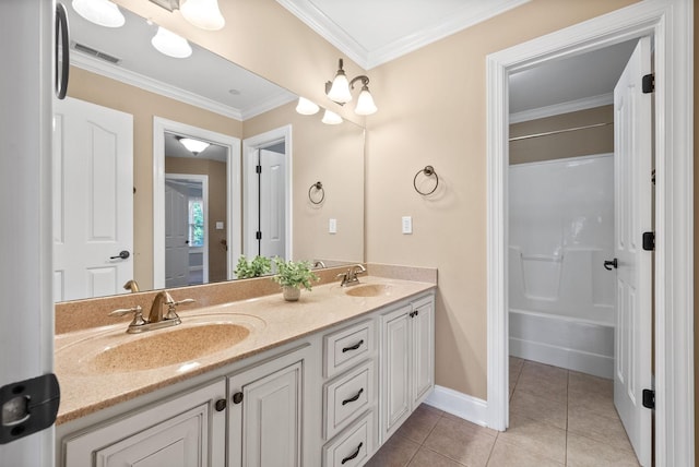 767 Dixie Ln, Pleasant View, TN 37146 - bathroom featuring double vanity, tile patterned flooring, crown molding, bathtub / shower combination, and baseboards
