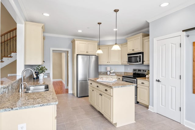 767 Dixie Ln, Pleasant View, TN 37146 - kitchen featuring cream cabinets, stainless steel appliances, a sink, light stone counters, and ornamental molding