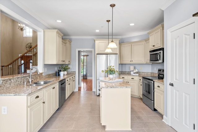 767 Dixie Ln, Pleasant View, TN 37146 - kitchen featuring appliances with stainless steel finishes, cream cabinets, a sink, healthy amount of natural light, and recessed lighting
