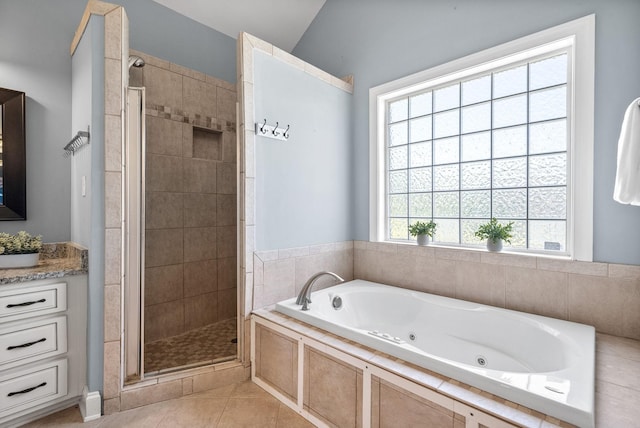 767 Dixie Ln, Pleasant View, TN 37146 - bathroom featuring a stall shower, a tub with jets, tile patterned floors, and vanity
