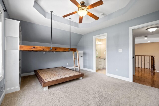 767 Dixie Ln, Pleasant View, TN 37146 - carpeted bedroom with baseboards, a tray ceiling, ensuite bathroom, and recessed lighting