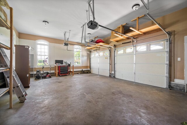 767 Dixie Ln, Pleasant View, TN 37146 - garage featuring a garage door opener