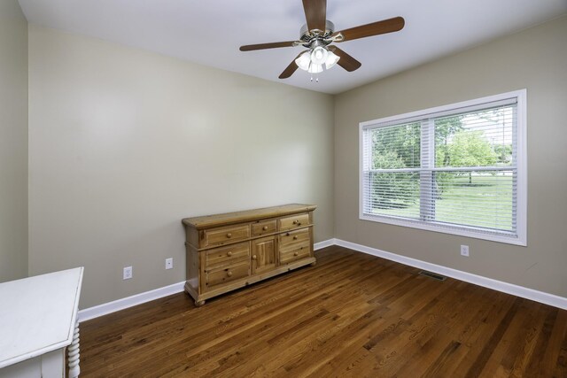2815 Windy Way, Thompsons Station, TN 37179 - unfurnished room featuring baseboards, dark wood-style flooring, and a ceiling fan