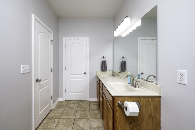 2815 Windy Way, Thompsons Station, TN 37179 - full bath with double vanity, tile patterned flooring, and baseboards
