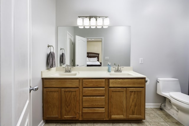 2815 Windy Way, Thompsons Station, TN 37179 - full bath featuring double vanity, tile patterned flooring, toilet, ensuite bath, and baseboards