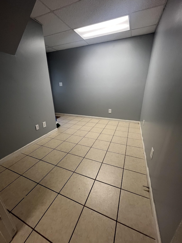 924 Granny White Rd, Clarksville, TN 37040 - unfurnished room with a paneled ceiling, light tile patterned flooring, and baseboards