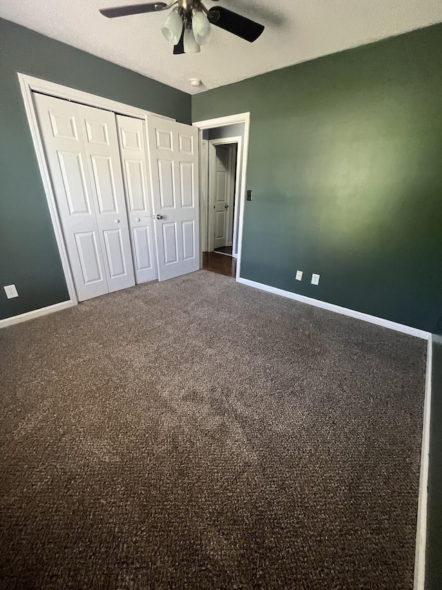924 Granny White Rd, Clarksville, TN 37040 - unfurnished bedroom featuring baseboards, a closet, a ceiling fan, and carpet flooring