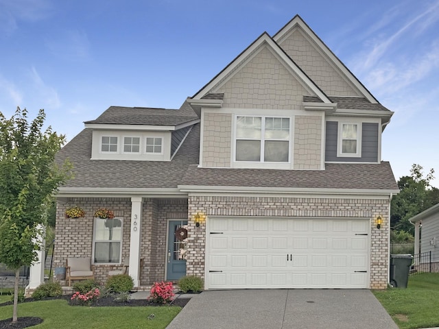 360 Gulfstream Dr, Gallatin, TN 37066 - craftsman-style house with concrete driveway, a garage, a shingled roof, and a front yard
