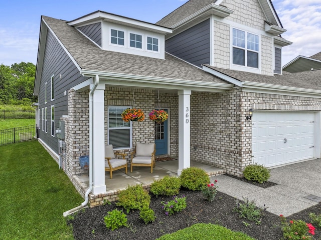 360 Gulfstream Dr, Gallatin, TN 37066 - view of front facade with covered porch, a shingled roof, brick siding, and driveway