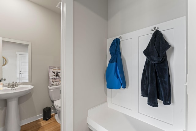 360 Gulfstream Dr, Gallatin, TN 37066 - mudroom featuring wood finished floors, baseboards, and a sink