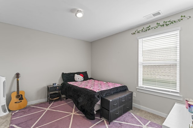 360 Gulfstream Dr, Gallatin, TN 37066 - carpeted bedroom featuring multiple windows and baseboards