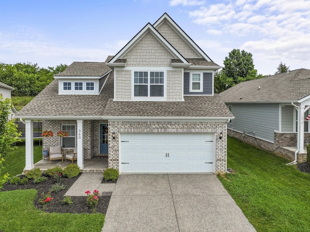 360 Gulfstream Dr, Gallatin, TN 37066 - view of front of home featuring concrete driveway, roof with shingles, a front yard, a porch, and a garage