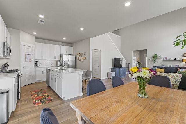 360 Gulfstream Dr, Gallatin, TN 37066 - dining space with light wood-type flooring and recessed lighting