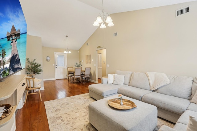 3408 Bruner Ct, Nashville, TN 37211 - living room featuring a chandelier, wood finished floors, high vaulted ceiling, and baseboards