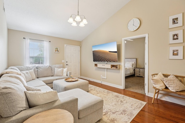 3408 Bruner Ct, Nashville, TN 37211 - living area featuring a chandelier, wood finished floors, baseboards, and high vaulted ceiling