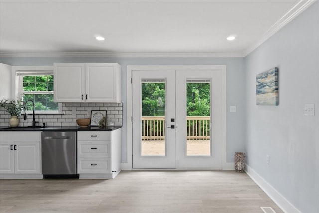 244 Beartown Rd S, Loretto, TN 38469 - kitchen with dishwasher, a sink, french doors, dark countertops, and ornamental molding