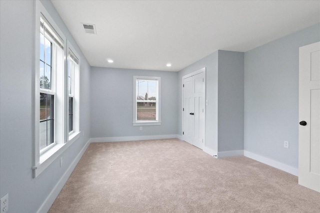 244 Beartown Rd S, Loretto, TN 38469 - unfurnished bedroom with light carpet, baseboards, recessed lighting, and a closet