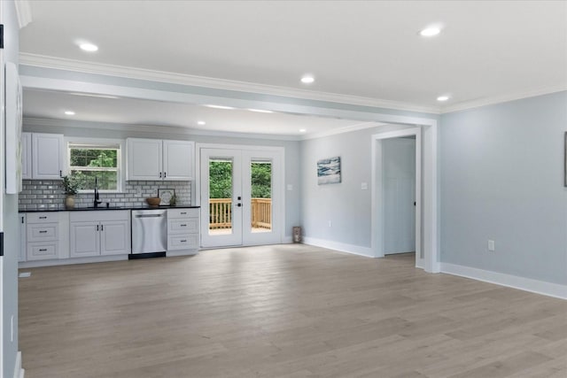 244 Beartown Rd S, Loretto, TN 38469 - bar with stainless steel dishwasher, a sink, french doors, baseboards, and ornamental molding