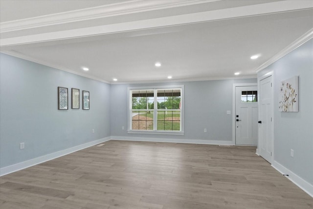 244 Beartown Rd S, Loretto, TN 38469 - unfurnished living room featuring recessed lighting, crown molding, light wood-style floors, and baseboards
