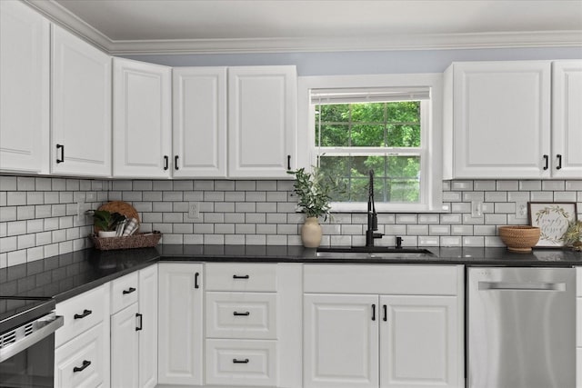 244 Beartown Rd S, Loretto, TN 38469 - kitchen featuring stainless steel dishwasher, a sink, dark countertops, white cabinetry, and backsplash
