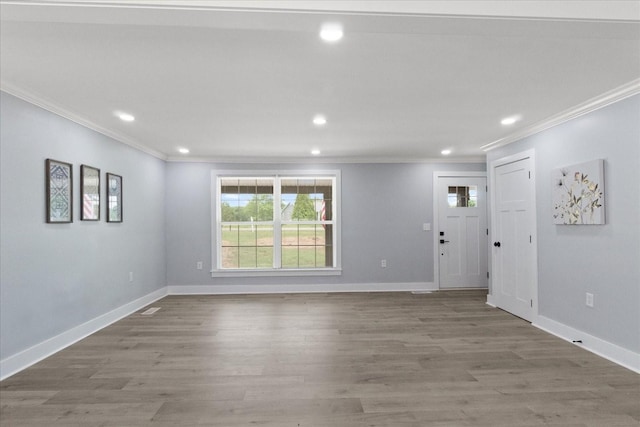 244 Beartown Rd S, Loretto, TN 38469 - unfurnished living room featuring crown molding, recessed lighting, baseboards, and wood finished floors