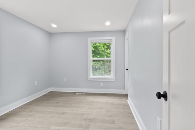 244 Beartown Rd S, Loretto, TN 38469 - empty room with light wood-type flooring, baseboards, and recessed lighting
