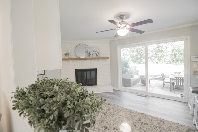 204 Tyne Blvd, Old Hickory, TN 37138 - living area featuring crown molding, a ceiling fan, wood finished floors, and a fireplace