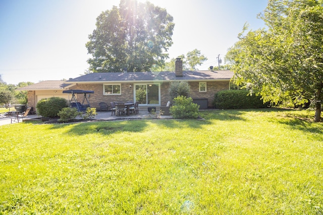 204 Tyne Blvd, Old Hickory, TN 37138 - rear view of house with a patio, brick siding, and a lawn