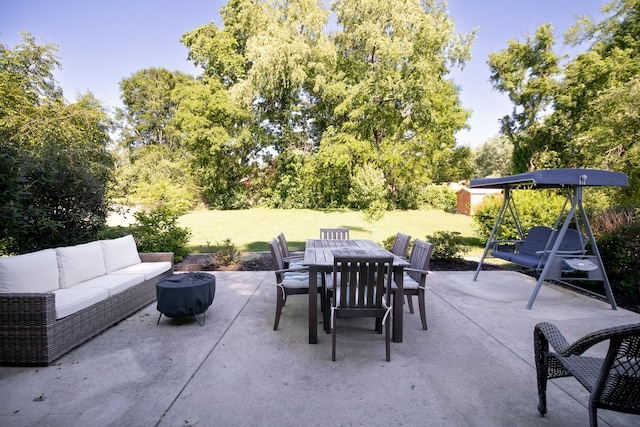 204 Tyne Blvd, Old Hickory, TN 37138 - view of patio with outdoor dining space, an outdoor living space with a fire pit, and view of wooded area