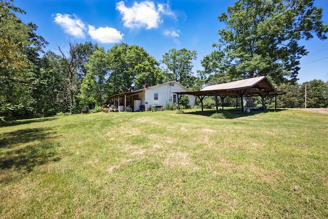 3148 Rawlings Rd, Woodlawn, TN 37191 - view of green lawn with a detached carport and a gazebo
